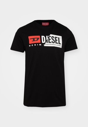 T-shirt noir à manches courtes avec logo Diesel rouge et blanc et texte "Denim for Successful Living" au centre devant.