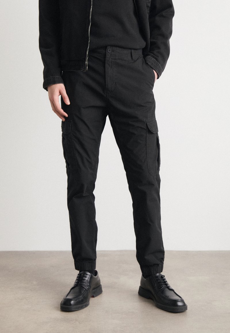 Tommy Jeans ETHAN - Calças cargo - black