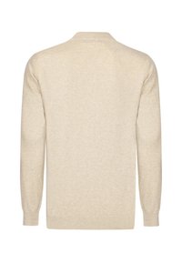 Suéter beige de pullover, hecho de un suave tejido de punto, con cuello redondo, mangas largas y puños y dobladillo acanalados.