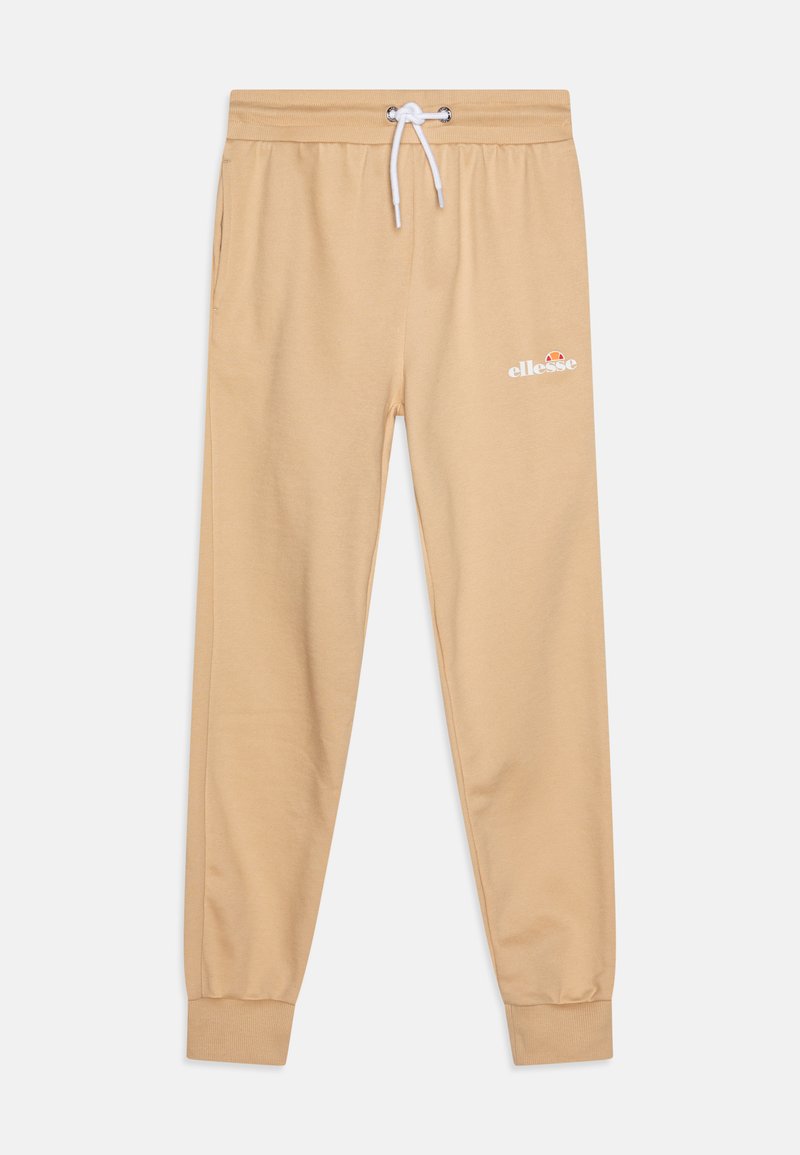 Light beige sweatpants with a drawstring waist, ribbed cuffs, side pockets, and a white logo on the left thigh. Smooth cotton texture.