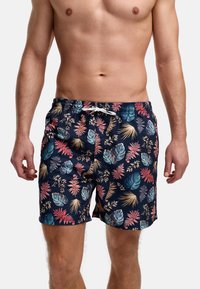 Herre svømmeshorts i marineblå, med et flerfarget tropisk bladmønster. Elastisk midjebånd med snor og sidelommer.