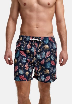 Herre svømmeshorts i marineblå, med et flerfarget tropisk bladmønster. Elastisk midjebånd med snor og sidelommer.