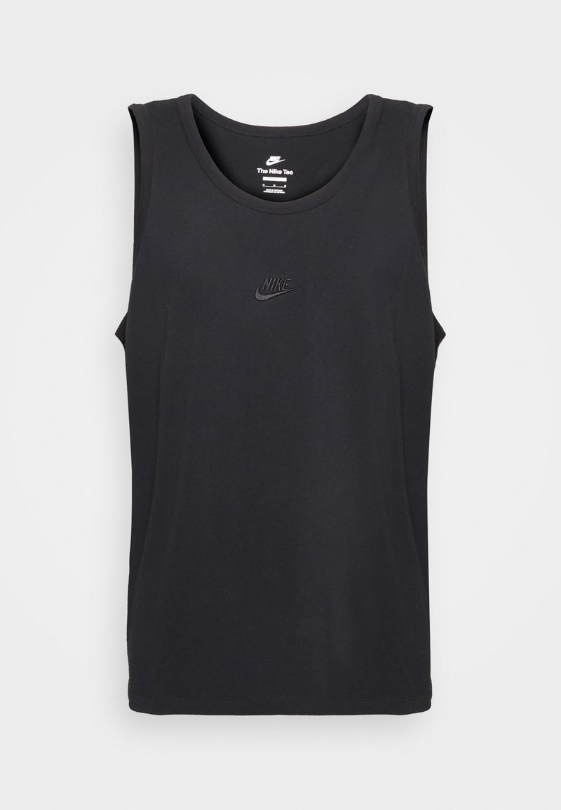Tank top sin mangas de Nike en color negro, hecho de algodón, con un cuello redondo y un pequeño logo en relieve en el pecho. Tejido de textura suave.
