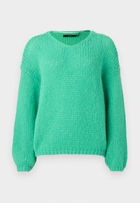 Pull tricoté vert menthe avec col en V, coupe ample et manches longues. Surface texturée avec une apparence de fil épais et doux.