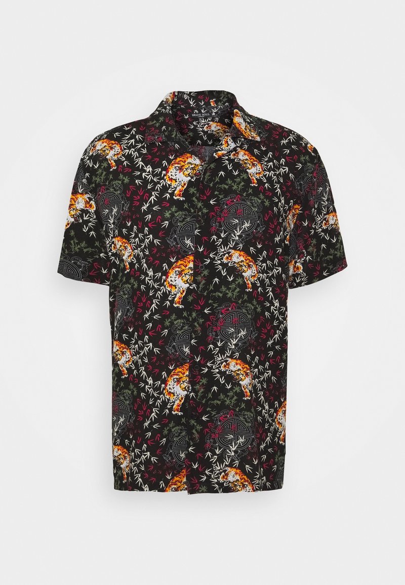 Camicia a maniche corte con sfondo nero e vivaci motivi di tigri e fogliame in tonalità di arancione, verde e rosso.