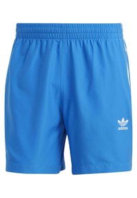 Pantaloni sportivi blu realizzati in tessuto morbido. Presentano una vita elastica, il logo Adidas bianco e strisce laterali per un tocco di dettaglio in più.