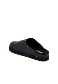 Black slip-on slipper featuring a soft inner lining, rounded shape, smooth exterior, and decorative silver stud accents on the side.