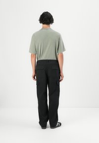 Hollister Co. SKATER BAGGY - Kareiviško stiliaus kelnės - black