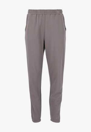 Grå joggerbyxor med elastisk midja, sidofickor och smalnande ben. Tillverkade av ett slätt, lätt material med minimal struktur.