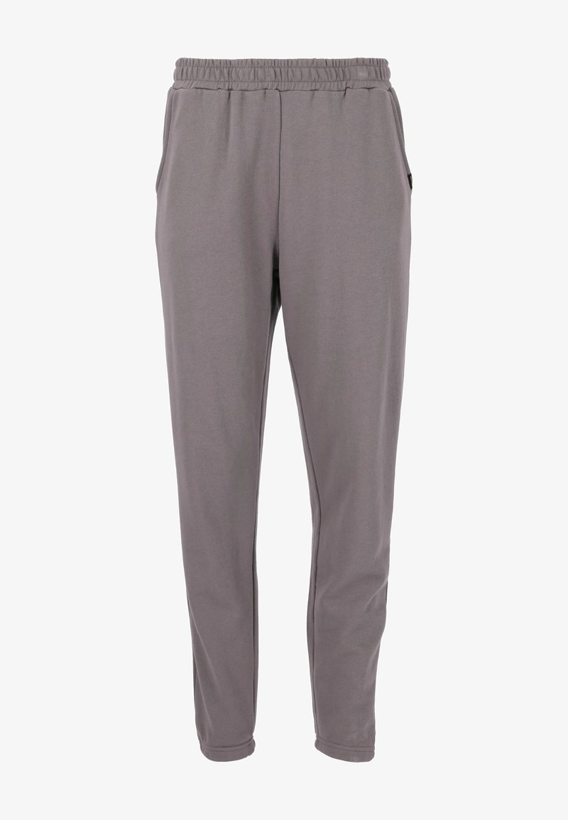 Grå joggerbyxor med elastisk midja, sidofickor och smalnande ben. Tillverkade av ett slätt, lätt material med minimal struktur.