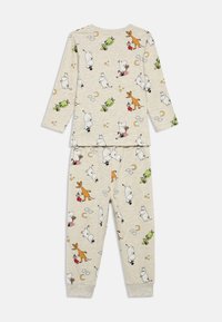 Light beige pajama set in soft fabric featuring colorful cartoon characters, with long sleeves and tapered pants, detailed with stars and moons.