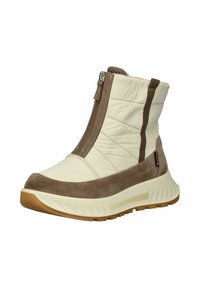 Beige gewatteerde laarzen met bruine suède accenten, middenhoogte schacht, zijritssluiting en een gestructureerde witte zool met grip kenmerken.