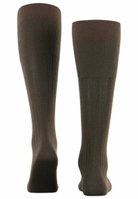 Braune, knielange Socken mit gerippter Textur und verstärkter Zehenpartie. Glatte Oberfläche, entwickelt für Komfort und Langlebigkeit.