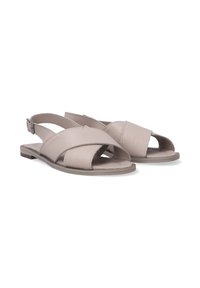 Slingback-sandalen van licht taupe leer met gekruiste voorbanden en open tenen. Platte zool met subtiele stikdetails. Verstelbare gesp-sluiting.