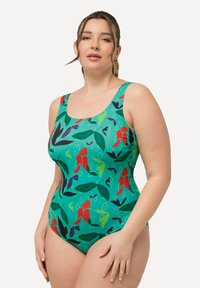 Maillot de bain une pièce avec un arrière-plan vert vif orné de motifs floraux rouges, violets et bleus. Texture lisse, bretelles larges.