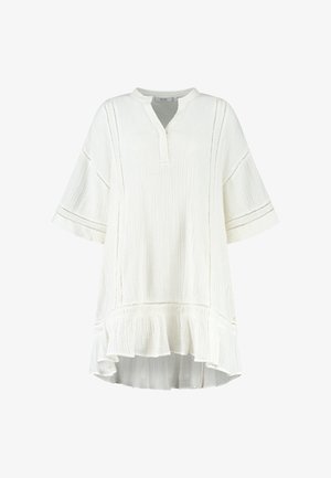 Witte katoenen tuniek met een textuurafwerking, V-hals, korte mouwen en een gerimpelde zoom. Heeft decoratieve stiksels en een comfortabele pasvorm.