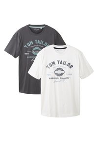 Zwei kurzärmelige T-Shirts; eines dunkelgrau, das andere weiß. Beide haben bedruckte Texte in Blau und Schwarz. Aus Baumwollstoff, mit Rundhalsausschnitt.