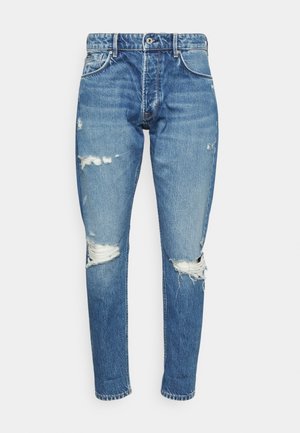 Jeans Tapered Fit - light-blue denim