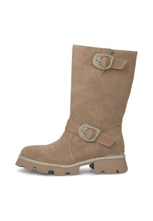 Brown suede knee-high boot features a decorative buckle and rhinestone accents, with a textured rubber sole and a chunky heel.