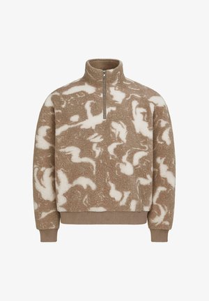 Fleece pullover i beige med et hvidt abstrakt mønster, med en halv lynlås ved halsen, lange ærmer og ribbede manchetter og kant.