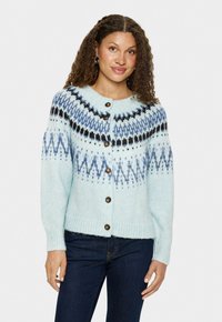 Vaaleansininen neulecardigan, jossa on kaunis kirjailtu kaulus sinisen ja mustan sävyissä. Tyylissä on viisi ruskeaa nappia sekä ribbireunat hihansuissa ja helmassa.