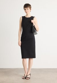 MARCIANO BY GUESS ZIP MIDI DRESS - Trikoomekko - black