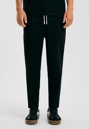 QS JOGGING - Jogginghose - schwarz