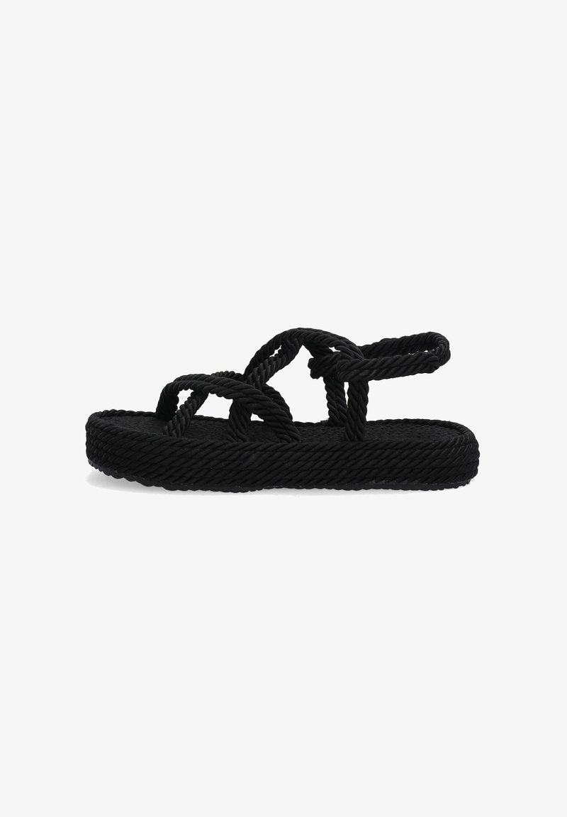 Schwarze Sandalen aus Seil verfügen über eine strukturierte flache Sohle und ein miteinander verflochtenes Design der Riemen. Die Riemen sind dick und bestehen aus geflochtenem Material.