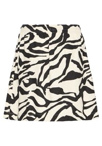 Jupe à rayures zèbre en noir et blanc avec une ceinture élastique et une forme légèrement évasée en A.