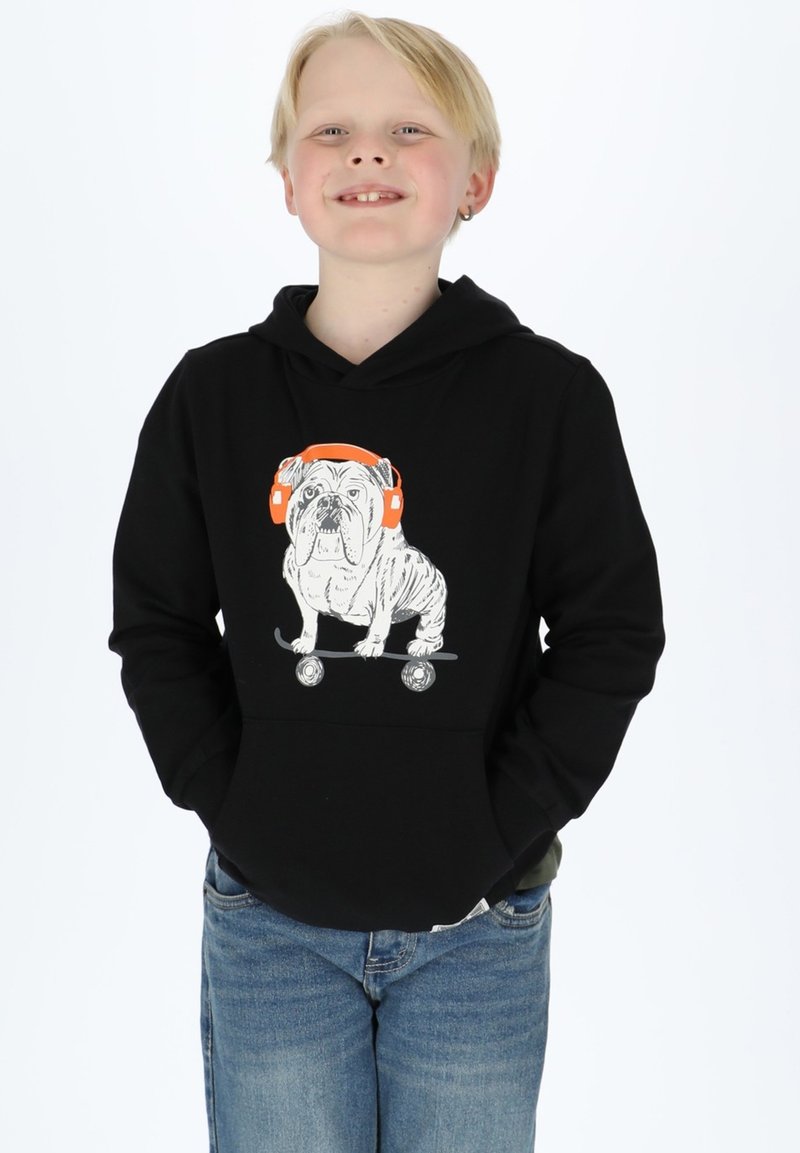 Black hooded sweatshirt featuring a graphic of a bulldog with orange headphones on a skateboard. Blue jeans visible below.