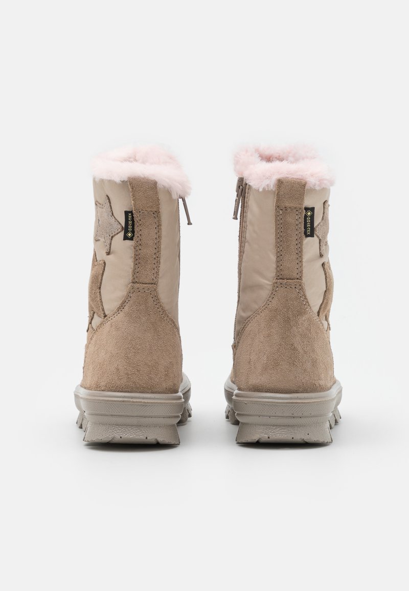 Beige Wildleder- und Nylonstiefel mit einem flauschigen rosa Innenfutter, ausgestattet mit Sternapplikationen und einem Reißverschluss an der Rückseite für leichtes An- und Ausziehen. Strukturiertes Profil für guten Halt.