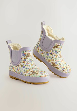 Colorful floral rain boots with lavender accents, molded rubber construction, textured soles, and plush lining for comfort and insulation.