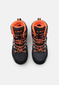 Black and gray hiking boots featuring orange accents, textured fabric, and laces, with a cushioned collar and reinforced toe.