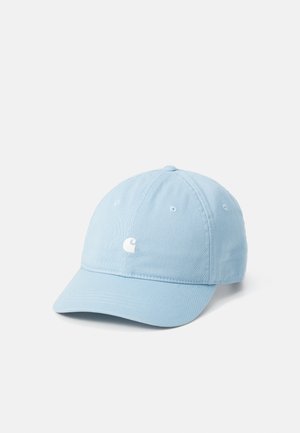 Light blue cotton baseball cap with a curved visor, embroidered logo on the front, and six ventilation eyelets. Plain texture.