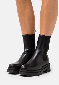 Dune London PALMZ - Botas de tornozelo com plataforma - black