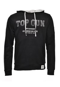 Svart hoodie med grå inredning, med vit "TOP GUN"-text och ytterligare grafik. Inkluderar dragskord och frontficka för händer.