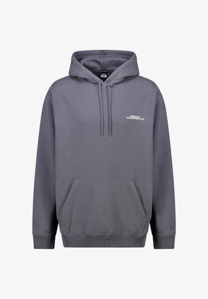 Grijze fleece hoodie met een voorzak in kangoeroestijl, capuchon met trekkoord en witte tekst "Museum of Contemporary Art". Zachte textuur.
