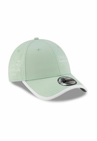 Mint green baseball cap with a white bill, featuring embroidered palm trees and waves. Includes adjustable back and branded hardware.