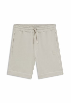 Pantaloncini casual beige chiaro con vita elasticizzata, coulisse, tasche laterali e una discreta toppa con logo sulla gamba sinistra anteriore.