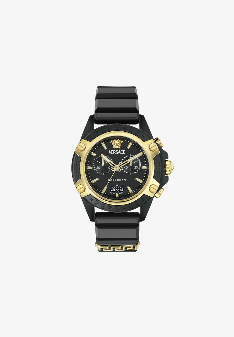 Versace pulksteņi ar melnu siksnu un zelta akcentiem. Iekļauj melnu ciparnīcu, hronogrāfa funkciju un Grieķu atslēgas dizainu siksnā.