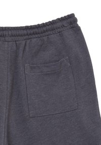 I pantaloni jogger grigi presentano un tessuto morbido e testurizzato, una vita elastica e una singola tasca posteriore con cuciture a contrasto.