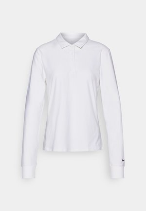 Polo blanc à manches longues avec col boutonné et logo Nike noir sur le poignet gauche, présenté sur fond uni.