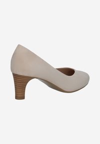 Beige suede pump with a rounded toe and a 5 cm stacked heel, featuring a smooth texture and a minimalist design.