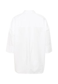 Camicia bianca a maniche lunghe con yoke posteriore. Presenta un colletto classico, polsini con bottone e una silhouette rilassata. Tessuto in cotone liscio.