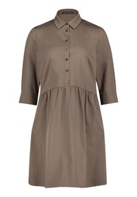 Draped shirt dress in a muted taupe color, with a buttoned front, collared neckline, and three-quarter sleeves. Smooth fabric texture.
