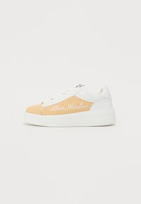 Orange mesh upper with white leather accents, featuring white branding. Thick white rubber sole, lace-up design, and rounded toe.
