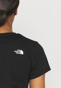 The North Face EASY - Potiskana majica - black