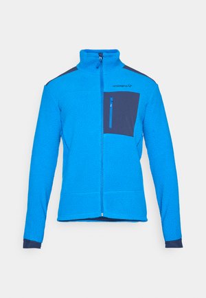 Mėlynas fliso džemperis su aukštu apykakle, pilnu užtrauktuku ir tamsiai mėlynu krūtinės kišeniu. Pasižymi tekstūruota medžiaga ir kontrastingomis tamsiai mėlynomis detalėmis ant pečių.