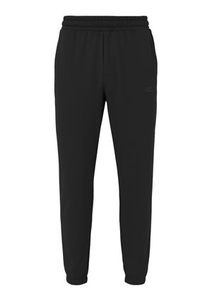 Schwarze Jogginghosen mit elastischem Bund, schmal zulaufendem Bein und gerippten Bündchen. Glattes Material ohne sichtbare Logos oder Muster.