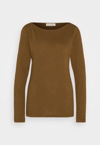 Pitkähihaisesta ruskeasta paidasta, joka on valmistettu pehmeästä, teksturoidusta kankaasta, on pyöreä kaula-aukko ja slim fit -leikkaus. Yksinkertainen muotoilu, ei lisäkoristeluja.
